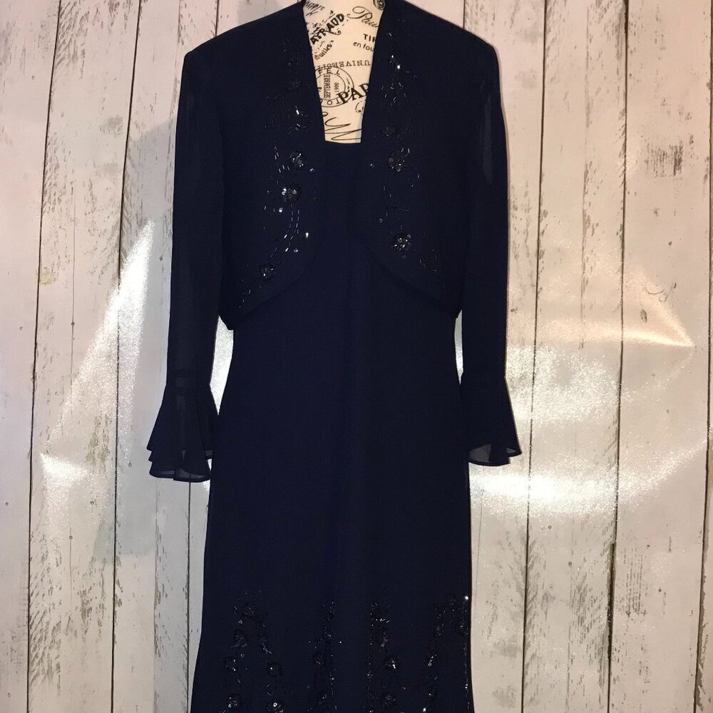 Metaphor Navy special occasion dress with beading and sheer accents.  Size 18
